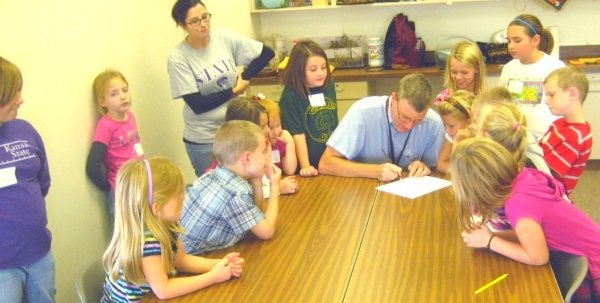 Wes teaching a workshop with kids as part of the World of Nature in Miniature exhibition
